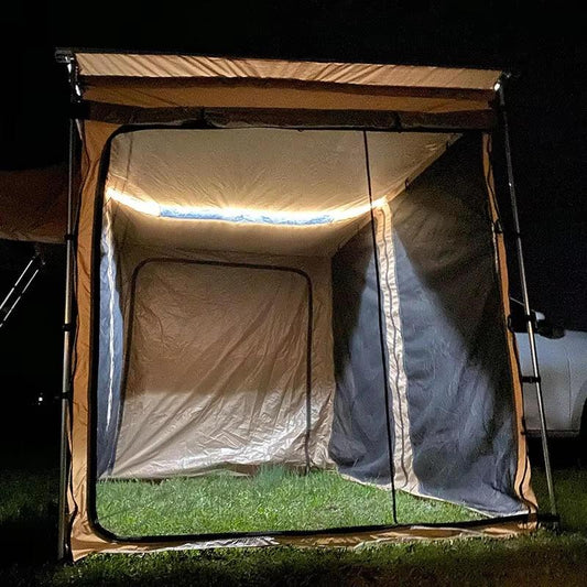Illuminated camping tent setup at night on grass, showcased by Nightline Supply Co.